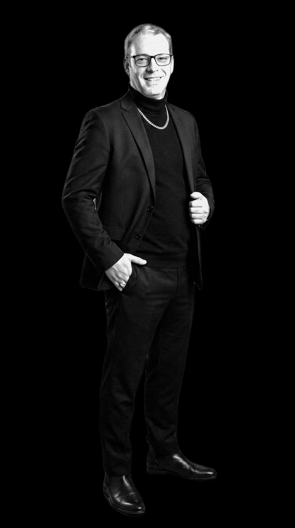 DC, standing, in a dark jacket